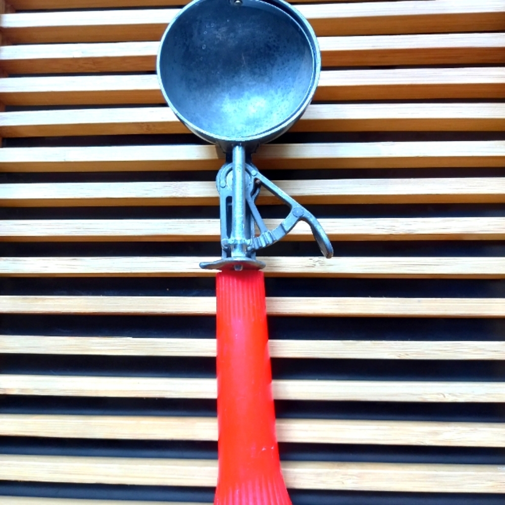 Red mechanical ice cream scoop